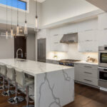 white quartz countertops, waterfall kitchen countertop
