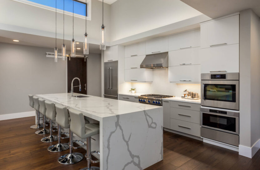 white quartz countertops, waterfall kitchen countertop